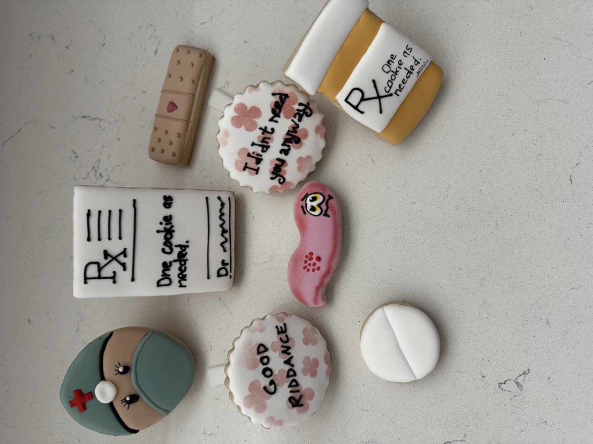 Nurse retirement themed decorated sugar cookies including a nurse cap, a prescription pad, a bandage, and cookies reading "Good Riddance" and "I didn't need you anyway"